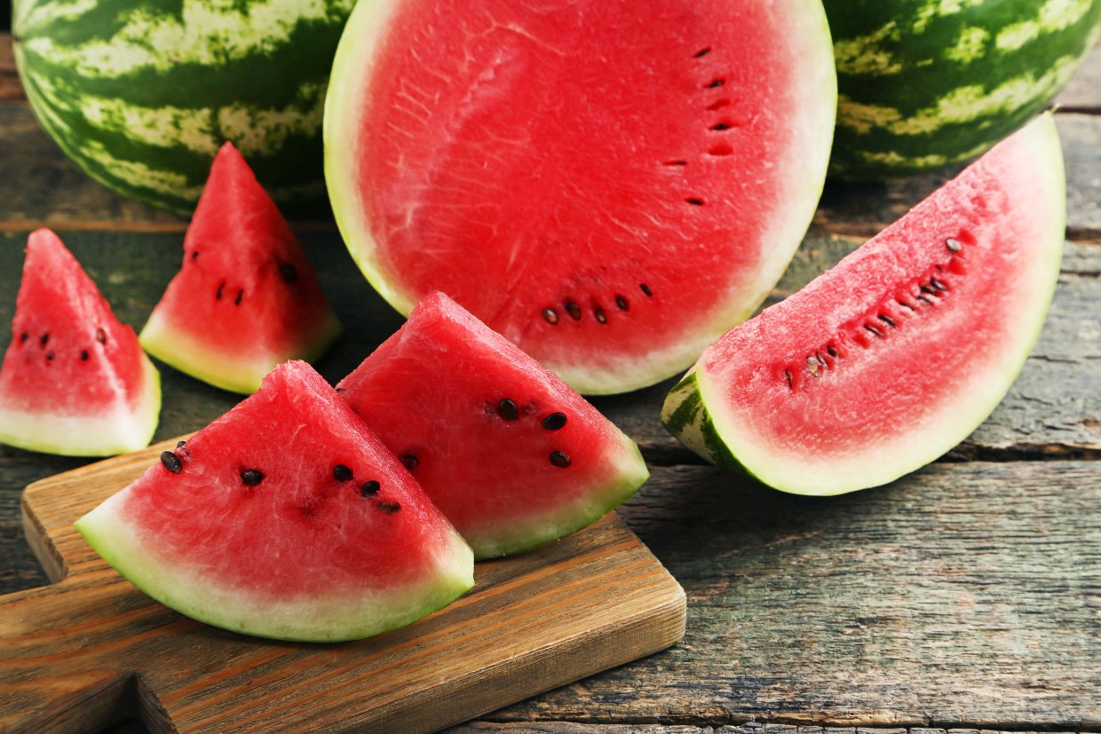 Slices,Of,Watermelons,On,Cutting,Board