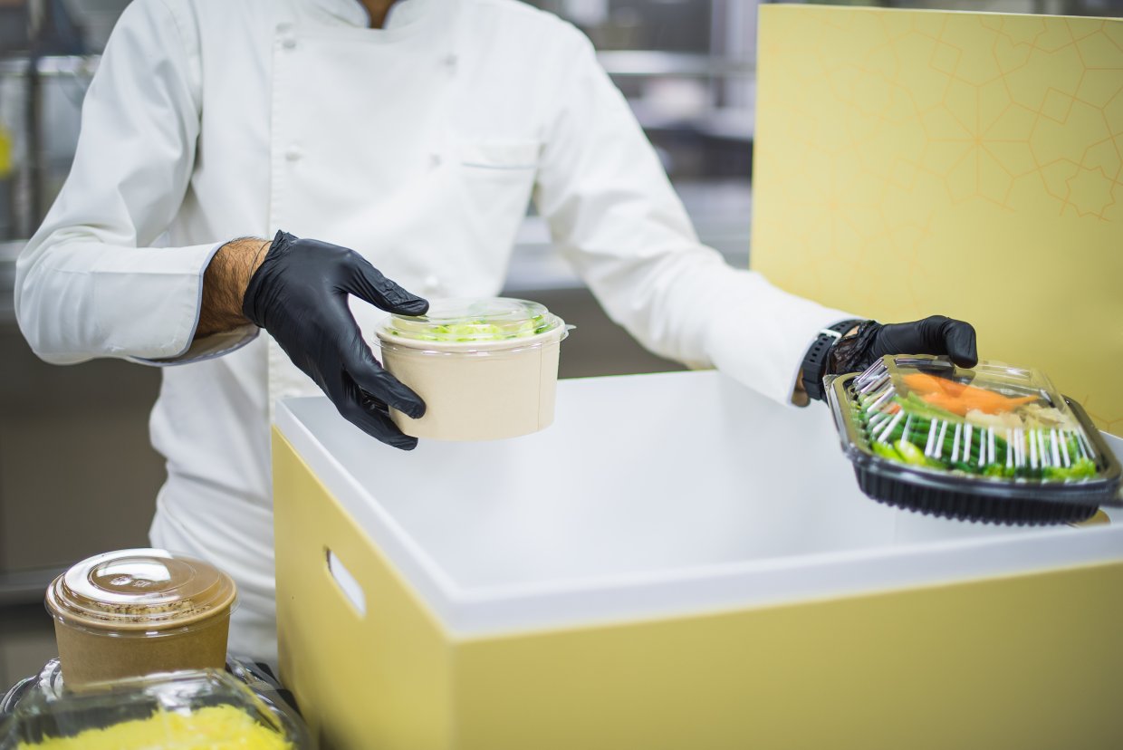 A,Chef,In,Black,Gloves,And,A,White,Uniform,Is