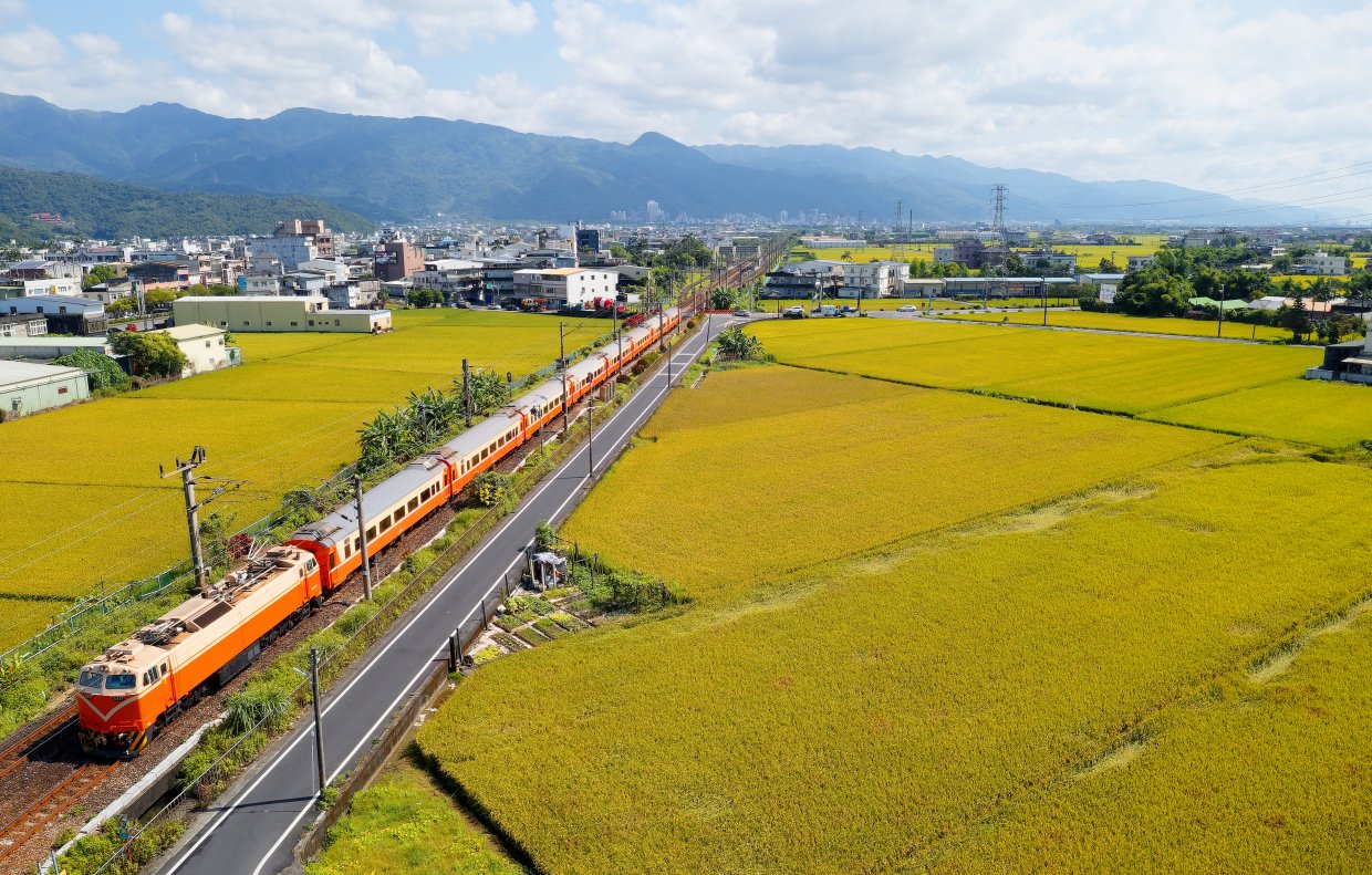Aerial,View,Of,A,Chu Kuang,Express,Train,Traveling,Thru,Rice