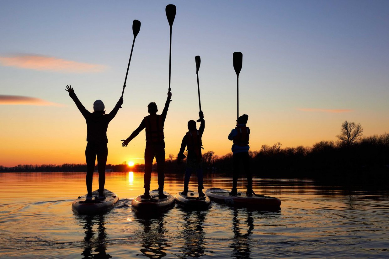 Four,Friends,On,Stand,Up,Paddle,Board,(sup),On,A