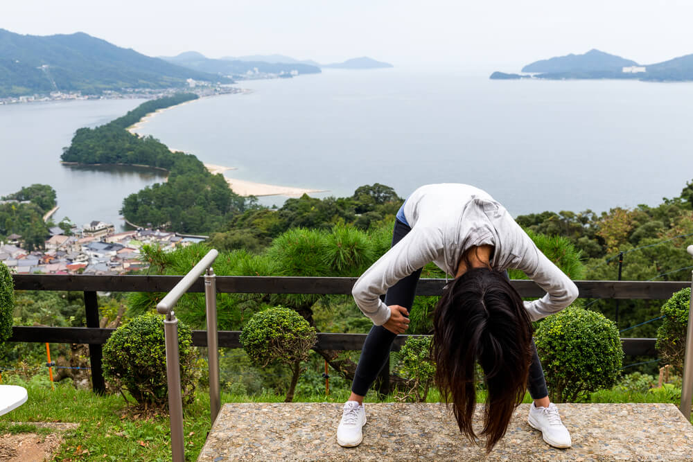 Woman,Upside,Down,And,Viewing,Of,Amanohashidate,In,Kyoto