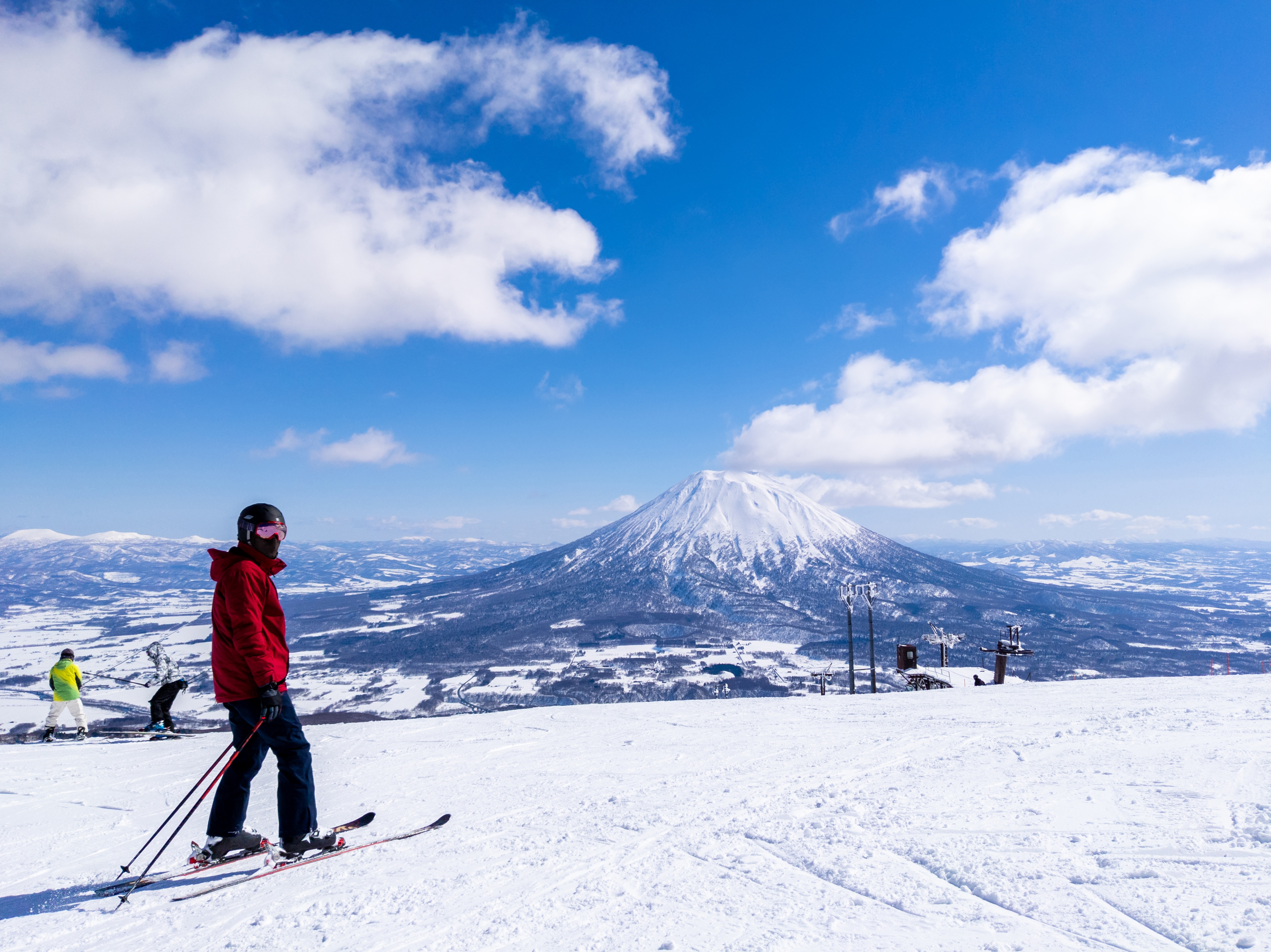 Skier,With,A,Snowy,Volcano,(niseko,,Hokkaido,,Japan)
